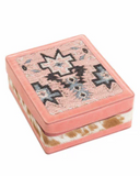 Pink jewelry box with patterned lid and cowhide design on base