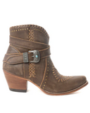 Brown leather boot with decorative strap and buckle on a white background