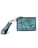 Turquoise tooled leather wallet with wrist strap on a white background
