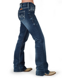 Blue jeans worn by a person on a white background