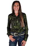 Woman wearing a green metallic shirt and blue jeans with a belt on a white background