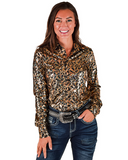 Woman wearing a leopard print shirt and jeans on a white background