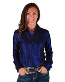 Person wearing a blue glitter shirt and jeans on a white background