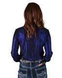Person wearing a blue glitter shirt and jeans on a white background