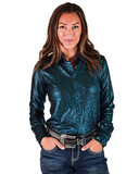 Woman wearing a teal glitter shirt and jeans on a white background
