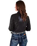 Person wearing a black sequined shirt and blue jeans on a white background