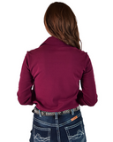 Person wearing a maroon shirt and blue jeans on a white background