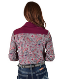 Person wearing a patterned shirt with a maroon collar on a white background