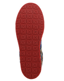Bottom of the Remmy Twisted X Kicks Sneaker in a white back drop.