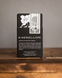 Back of the Soñora Perfume box displayed on a wooden table.