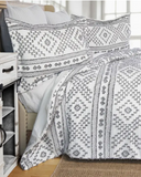 Ceniza Southwestern Comforter Set displayed in bedroom setting.