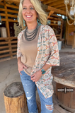 Acoma Aztec Duster styled and modeled by a women in western setting.