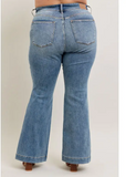 Steph High Waisted Trouser Flares being modeled on a women in front of white background.
