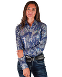 Woman wearing a blue patterned shirt and jeans on a white background