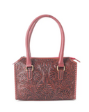 Red handbag with floral patterns on a white background