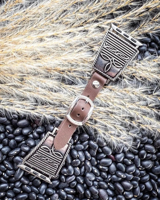 That western flair you wish your Apple Watch had? Yeah, it exists now 🤠⌚️

✅ Tooled metal ends with classic boot stitch detail
✅ Adjustable leather strap for the perfect fit
✅ Pairs perfectly with your everyday bracelet stack

It's giving ranch boss meets tech-savvy queen, and we are here for it. 👏🔥