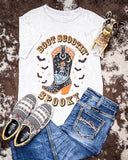 Boot Scootin Spooky Graphic Tee - Off White - Apparel - Lotus Fashion - Bronco Western Supply Co.