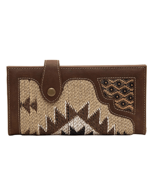 A brown leather wallet with a Southwestern-style woven pattern panel in beige, brown, and black, featuring a snap-button strap closure.