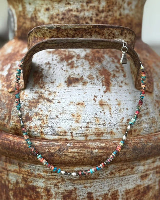 Multicolored beaded bracelet on a textured surface