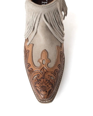 Beige ankle boot with brown floral embossing on a white background