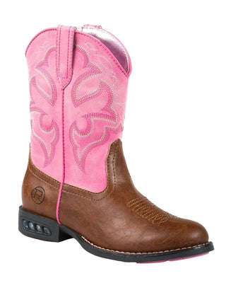 Girl's Little Kids Lightning boot by Roper in an angled view, showing a tan faux leather vamp, pink stitched shaft, round toe and motion light panels in the heel