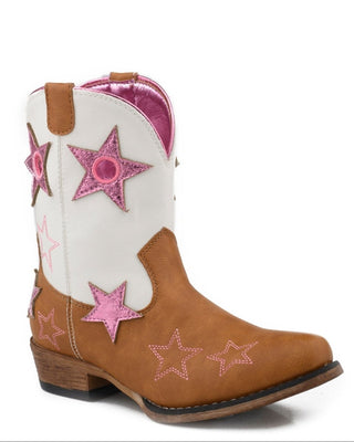 Girl's Little Kids Star Rodeo boot by Roper in an angled view, showing a tan faux leather vamp, white shaft, metallic pink stars and a snip toe