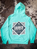 Back view of bright teal Bronco hoodie with large western-inspired logo graphic