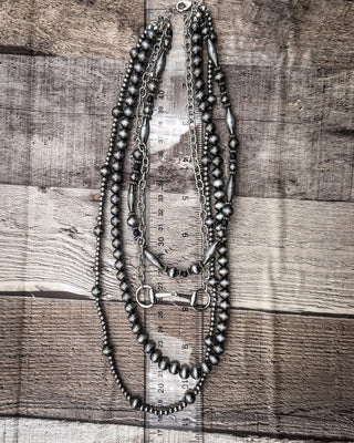 Iron Hollow Layered Beaded Necklace with Snaffle Bit Charm – Jewelry from Bronco Western Supply Co.