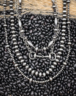 Iron Hollow Layered Beaded Necklace with Snaffle Bit Charm – Jewelry from Bronco Western Supply Co.