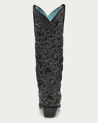A single black western cowboy boot with intricate floral cutout embroidery and rhinestone embellishments, shown from the back against a light gray background.