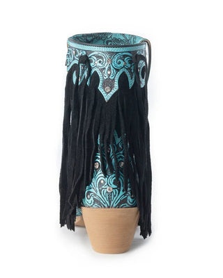 Decorative vase with turquoise pattern and black fringes on a white background