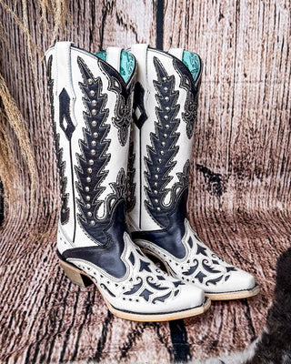 Side view of the Phantom Mesa Corral Boots in a wood backdrop.