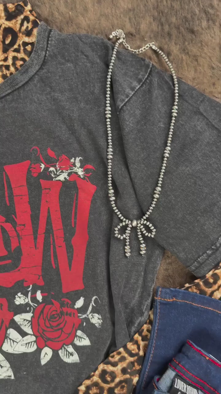 The kind of tee you reach for every dang day.
Soft-as-heck cotton, easy fits, and western graphics that actually match your vibe (not your boyfriend’s band tee from college.)

✔️ Dress it down with denim
✔️ Layer it under a blazer or flannel
✔️ Lounge in it, live in it, love on it

They’re cute, comfy, and never stay in stock for long.

Go ahead and grab the one you’ve been eyeing, we won’t tell. 😉