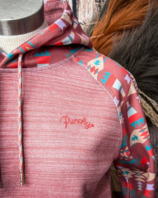 Red hoodie with geometric pattern and brand logo on a mannequin.