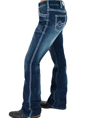 Blue jeans worn by a person on a white background