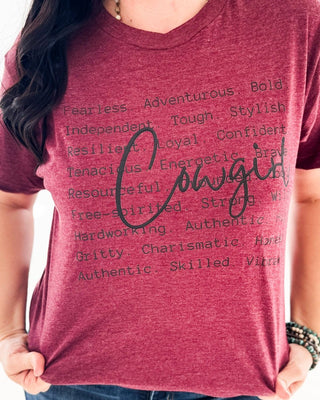 Red t-shirt with 'Cowgirl' and descriptive words on a red background