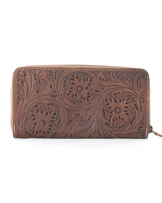 Brown leather wallet with intricate floral patterns on a white background