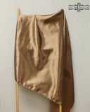 The Wynonna Wild Rag draped along a wooden ladder.