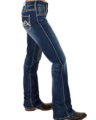 Blue jeans worn by a person on a white background