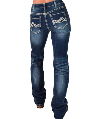 Blue jeans with decorative stitching on a white background
