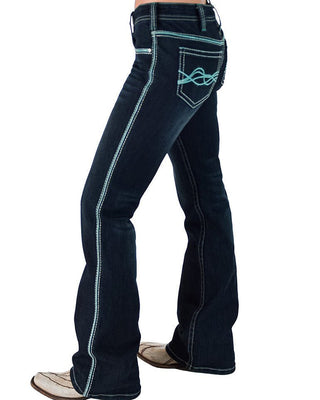 Dark blue jeans with white stitching on a white background