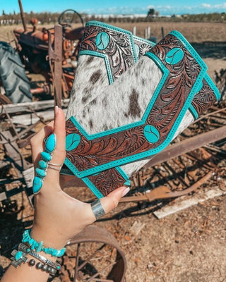 Wallets on rustic background.