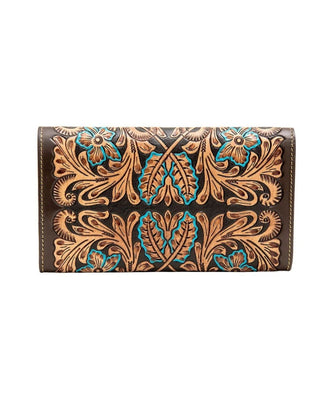 A brown leather wallet with intricate hand-tooled floral and scroll patterns in warm tan and turquoise blue, shown against a plain white background.