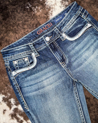 Windswept Feather Easy Boot Jeans in Dark Wash by Grace in LA – Apparel from Bronco Western Supply Co.